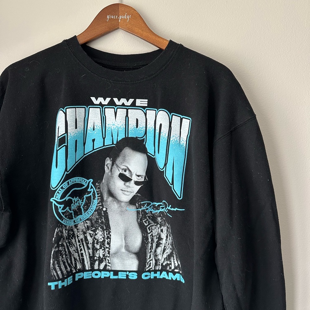 WWE Black Crewneck with Aqua-Blue Champion Graphic